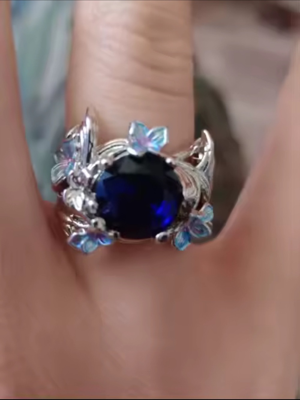 Silver Ring with Deep Blue Center and Blue Floral Accents - Picture 4 of 4